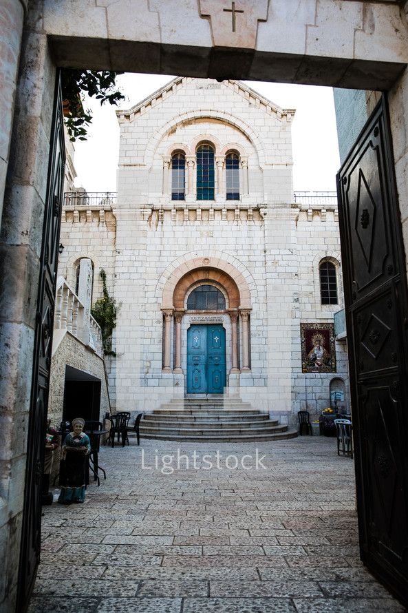 ancient church in Jerusalem with blue doors 
