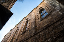 windows on a stone building in Jerusalem 
