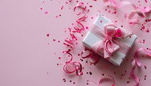 Elegant Gift Box with Pink Ribbon on a Pink Background with Heart Confetti