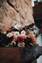 bridal bouquet on a mantle 