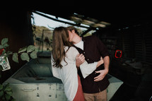 kissing in a garage 