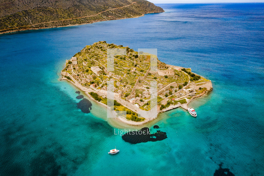 aerial view over fortified island 