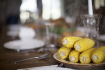 steaming hot corn on a Thanksgiving table 