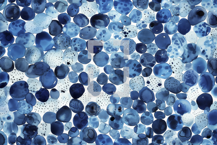 Intricate composition of blue watercolor dots, varying in shades and textures, evoking a sense of calm oceanic elements or denim bubbles.