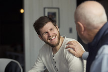 men in discussion at a Bible study 