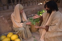 Jesus talking to a woman in the market 