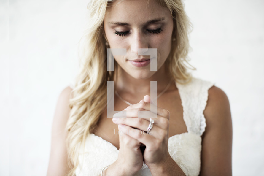 Praying bride.
