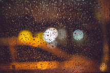 rain on a window and a taxi 