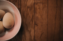 wooden eggs in a bowl 