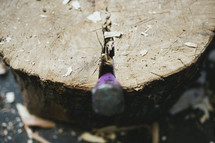 chisel in a log 