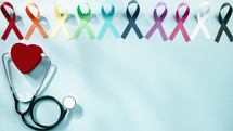 world cancer awareness day ribbons background with copy space