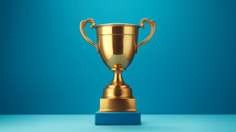 Gold trophy on a blue background. 