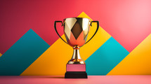 Gold trophy on a colorful background. 