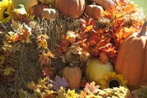 hay bales and pumpkin fall decorations 