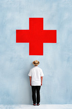 Minimalist medical poster featuring a man in a white coat and straw hat standing in front of a large red cross on a textured blue wall.