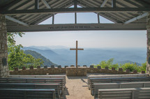 outdoor church with view of mountaintops 