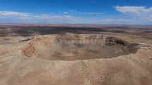 Aerial of a giant meteor crater in the American southwest