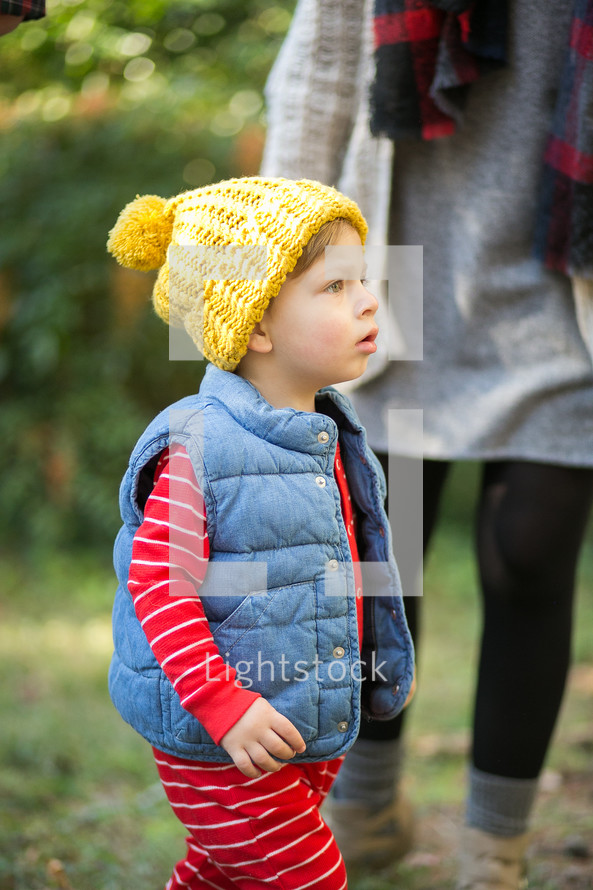 face of a toddler boy in a wool cap 