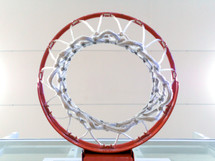 The basketball hoop seen from directly underneath.
