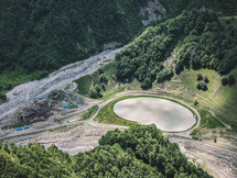 Artificial lake in the valley