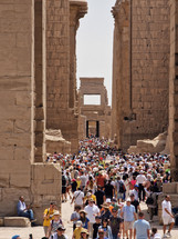 Luxor, Egypt - April 11, 2023: The opening hour at the Great Hypostyle Hall and clouds at the Temples of Karnak (ancient Thebes). Luxor, Egypt