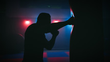 Silhouette of Boxing fighter in the gym