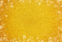 bokeh dots and yellow Glitter Background
