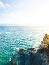 rocky cliff meets the ocean 