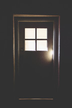 Light coming through a door.