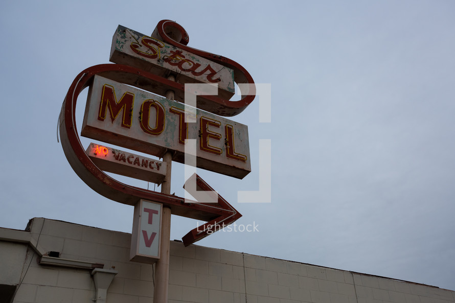 Small town motel with vintage sign and no vacancy