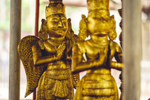 Gold Hindu idols at the Varaha Lakshmi Narasimha Hindu temple in India.