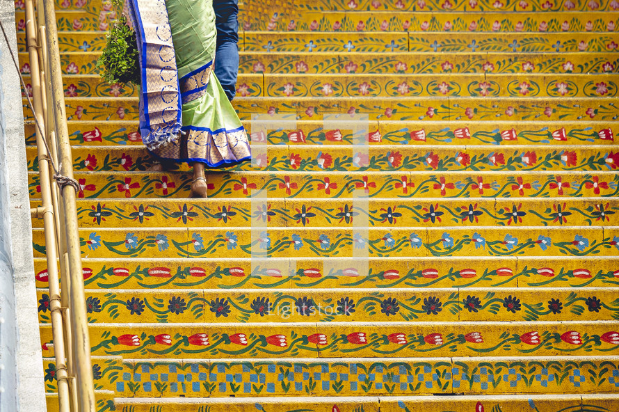 Hindu women walking up the steps of The Varaha Lakshmi Narasimha Hindu temple – Simhachalam in Vizag Visakhapatnam, India
