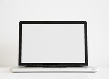 blank white screen on a laptop computer.
