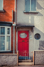 red door to a row house 