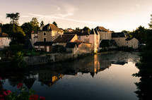 homes on a channel at sunset in France 