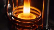 Metal parts heated with electric induction heating during production process