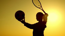 Silhouette of a child with sports equipment. The concept of children's sports. Healthy lifestyle, summer holidays.