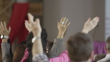 Hands of people worshiping God