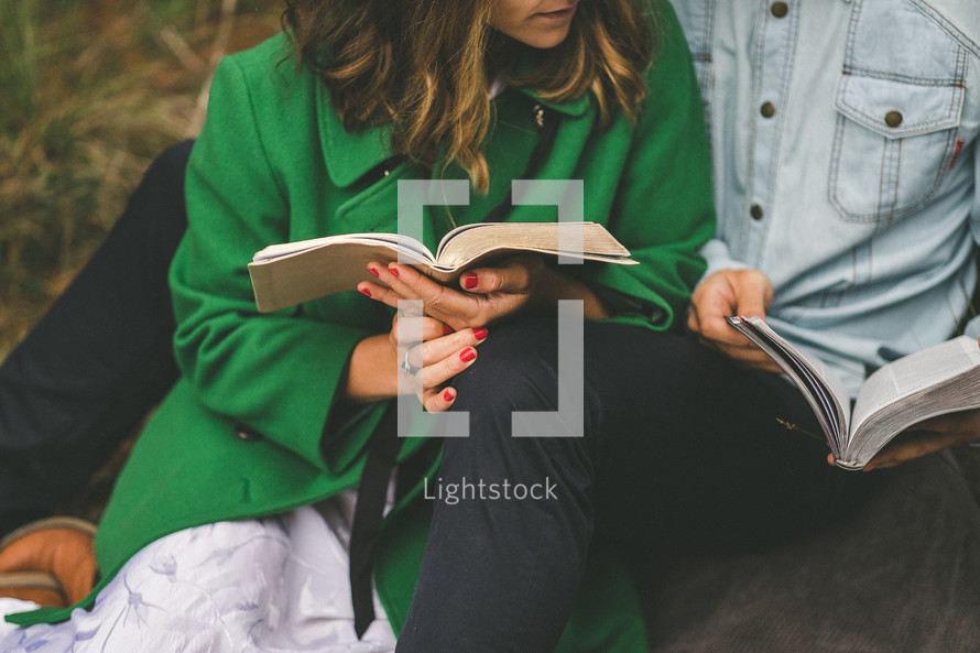 couple reading Bibles together 