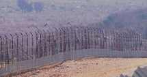 Border fence between Israel and Lebanon. barbed wire and electronic fence.