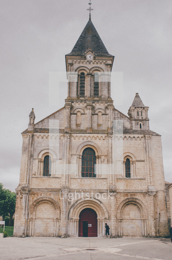 front of an old cathedral in France 