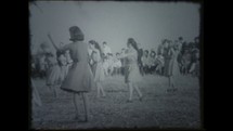 Menashe Heights, Israel, Circa 1940's. Film footage of people dancing Israeli folk dances in a kibbutz