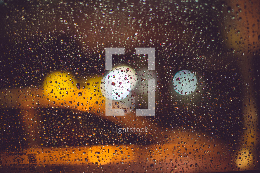 rain on a window and a taxi 