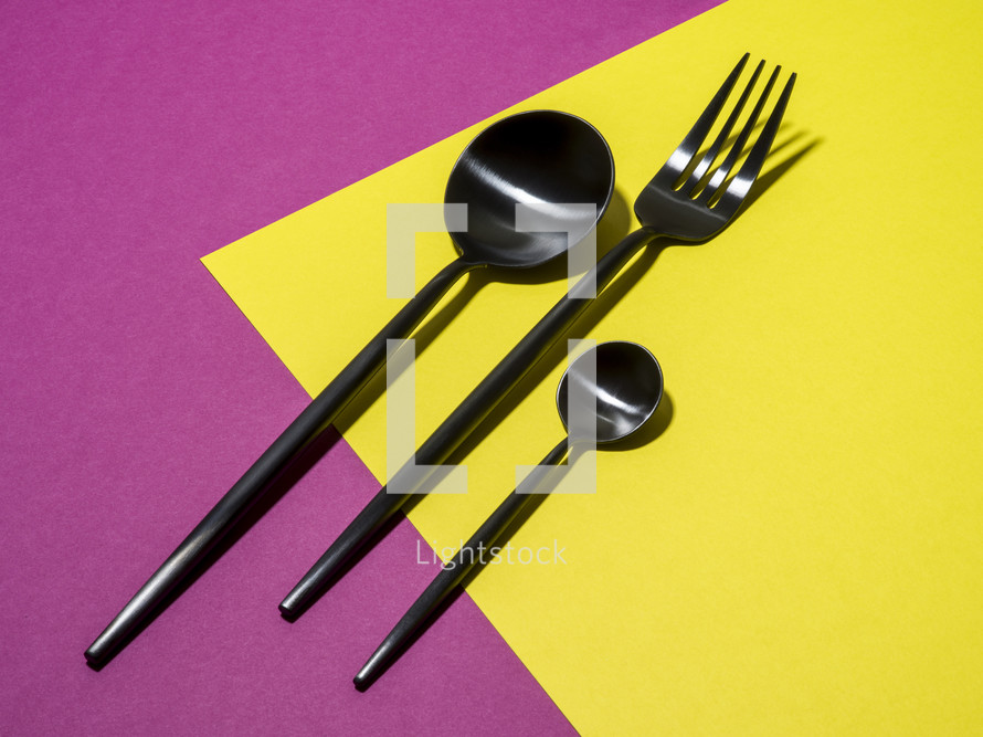 utensils on pink and yellow 