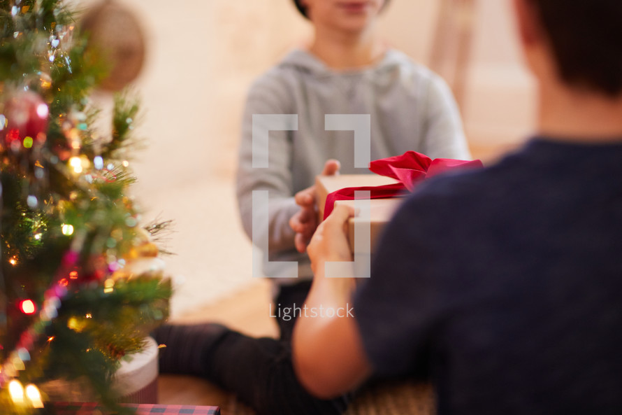 brothers giving Christmas gifts 
