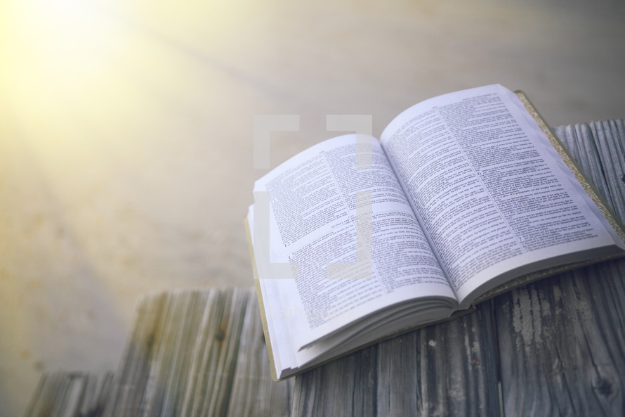 Bible at beach with copy space