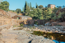 Roman bridge and natural pool in Las Mestas, Caceres, Extremadura, Spain