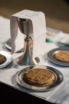 Covered communion cup and communion bread