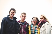 teens making silly faces 