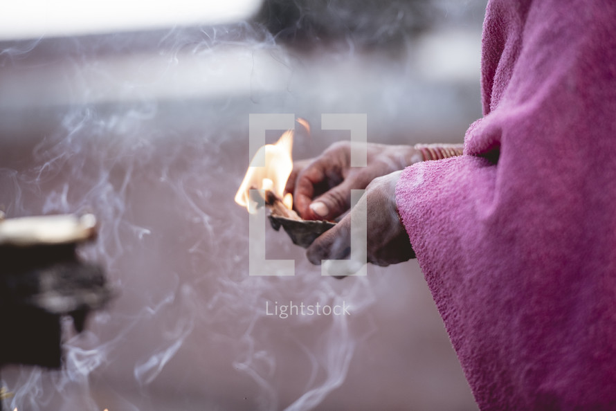 woman with candle and incense 